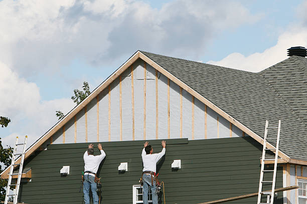 Professional Siding Repair technician working in Fombell, PA